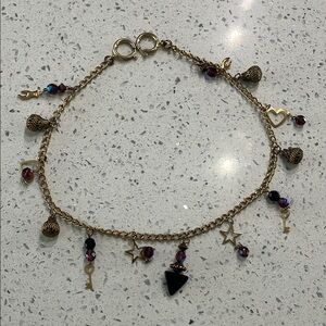 Necklace mystical Gold Charm Bracelet with Black and Purple Accents